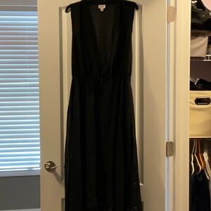 Black Lularoe.  Great for swim over or styled with jeans!